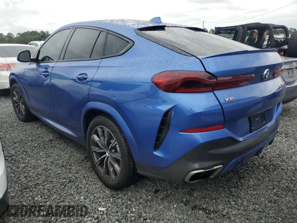 2020 BMW X6 M50i with VIN 5UXCY8C02L9B20285, listed as a Copart auction lot 74127524 with 0 mi miles and Non Repairable. Bid and sale history available at carsss.com. Image 2.