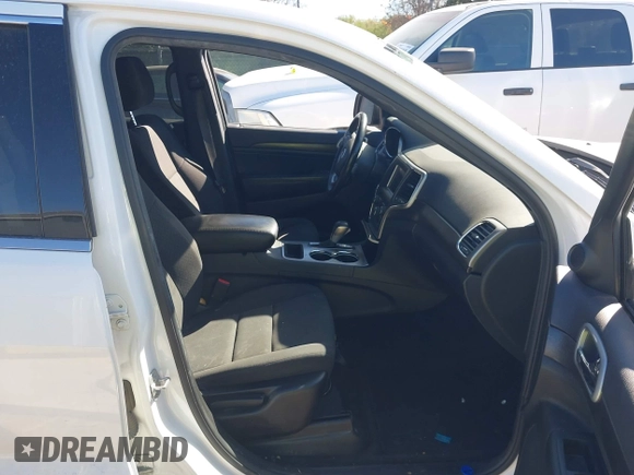2018 Jeep Grand Cherokee Laredo E with VIN 1C4RJEAG2JC428990, listed as a IAAI auction lot 41218996 with 123,758 mi miles. Bid and sale history available at carsss.com. Image 5.