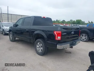 2015 Ford F-150 XLT with VIN 1FTEW1EG4FKD11928, listed as a IAAI auction lot 41912864 with 270,804 mi miles. Bid and sale history available at carsss.com. Image 3.