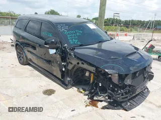 2023 Dodge Durango SRT Hellcat Premium with VIN 1C4SDJH9XPC554953, listed as a IAAI auction lot 42375728 with 19,492 mi miles and . Bid and sale history available at DreamBid. Image 6.