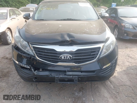 2013 Kia Sportage LX z VIN KNDPBCA27D7451269, wystawiony jako IAAI lot #42399187 z przebiegiem 119 507 mil mil oraz . Historia ofert i sprzedaży dostępna na DreamBid. Obrazek 6.