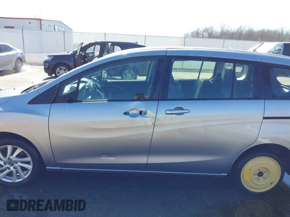 2013 Mazda 5 Sport with VIN JM1CW2BL6D0146696, listed as a IAAI auction lot 41657255 with 142,939 mi miles and . Bid and sale history available at DreamBid. Image 15.