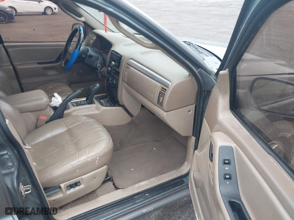 2002 Jeep Grand Cherokee Laredo with VIN 1J4GW48NX2C151430, listed as a IAAI auction lot 41886769 with 222,795 mi miles. Bid and sale history available at carsss.com. Image 5.