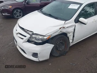 2011 Toyota Corolla L with VIN 2T1BU4EE1BC693128, listed as a IAAI auction lot 41948555 with 135,263 mi miles. Bid and sale history available at carsss.com. Image 6.