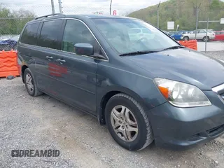 2005 Honda Odyssey EX with VIN 5FNRL38495B004614, listed as a IAAI auction lot 42128185 with 230,247 mi miles. Bid and sale history available at carsss.com. Image 1.