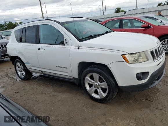 2011 Jeep Compass with VIN 1J4NT1FB8BD138161, listed as a Copart auction lot 73679894 with 199,735 mi miles and Salvage Title. Bid and sale history available at carsss.com. Image 4.