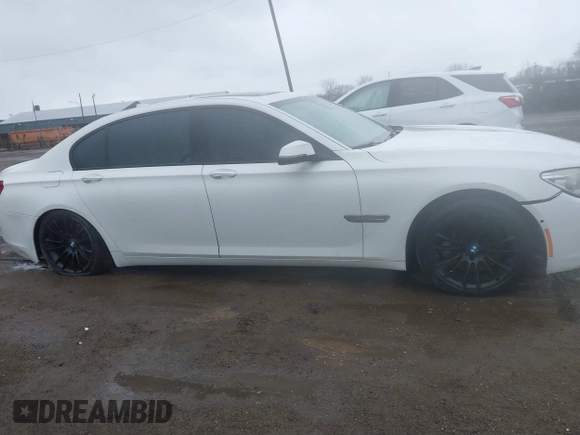 2015 BMW 7 Series 750Li xDrive with VIN WBAYF8C58FD655044, listed as a IAAI auction lot 41847227 with Not Provided miles and . Bid and sale history available at carsss.com. Image 13.