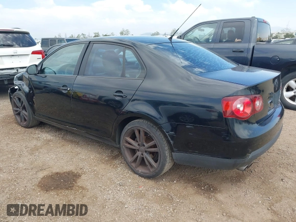2010 Volkswagen Jetta Sedan S with VIN 3VWJZ7AJ2AM060044, listed as a IAAI auction lot 42023971 with 106,228 mi miles. Bid and sale history available at carsss.com. Image 3.