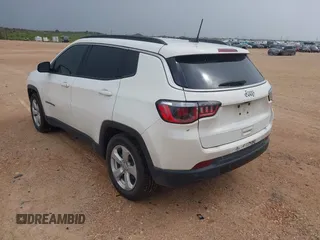 2019 Jeep Compass Latitude with VIN 3C4NJCBB3KT802907, listed as a IAAI auction lot 42595157 with 103,993 mi miles and . Bid and sale history available at DreamBid. Image 3.