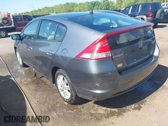 2010 Honda Insight EX with VIN JHMZE2H72AS021555, listed as a IAAI auction lot 42129289 with 172,829 mi miles and . Bid and sale history available at DreamBid. Image 3.