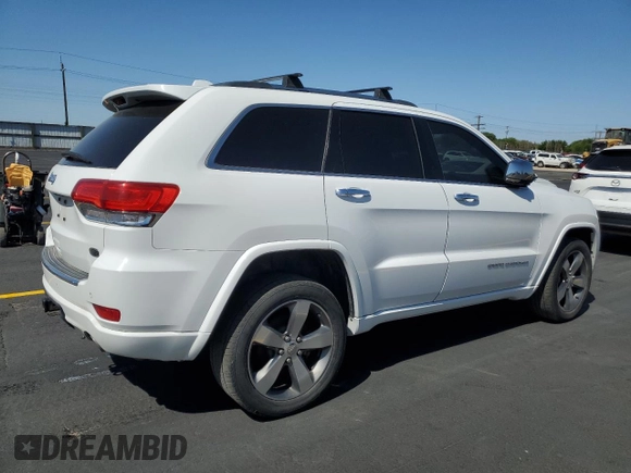 2015 Jeep Grand Cherokee Overland with VIN 1C4RJFCM4FC618516, listed as a Copart auction lot 58671455 with 221,550 mi miles and Clean title. Bid and sale history available at DreamBid. Image 3.