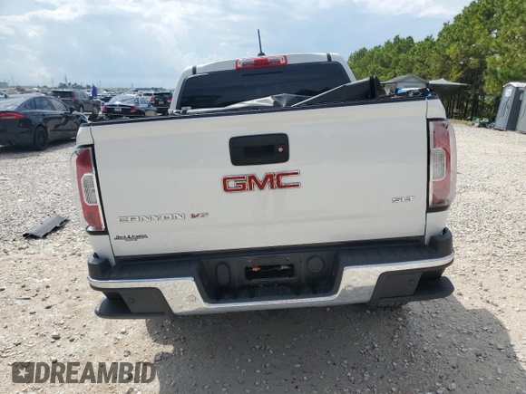 2020 GMC Canyon 2WD SLT z VIN 1GTG5DEN6L1172883, wystawiony jako Copart lot #71844604 z przebiegiem 81 504 mil mil oraz Czysty tytuł • Clean title. Historia ofert i sprzedaży dostępna na DreamBid. Obrazek 6.