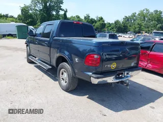 2001 Ford F-150 XLT with VIN 1FTRW08L71KC63676, listed as a IAAI auction lot 42536000 with 326,699 mi miles and . Bid and sale history available at DreamBid. Image 3.