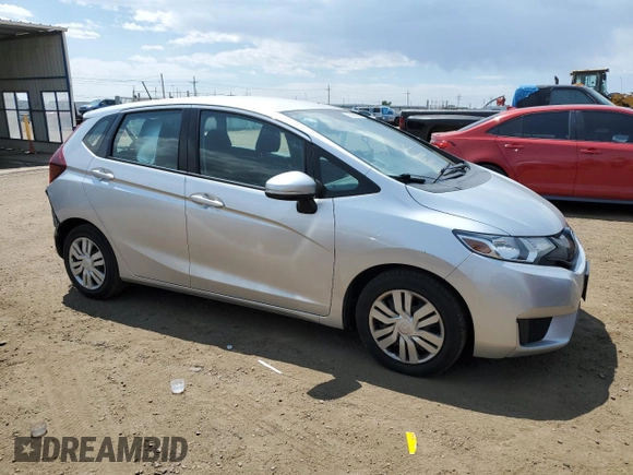 2015 Honda Fit LX with VIN 3HGGK5H59FM709104, listed as a Copart auction lot 63569065 with 101,859 mi miles and Salvage title. Bid and sale history available at DreamBid. Image 4.