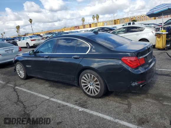 2012 BMW 7 Series 750i with VIN WBAKA8C57CDS99976, listed as a Copart auction lot 45202715 with 152,169 mi miles and Salvage title. Bid and sale history available at DreamBid. Image 2.