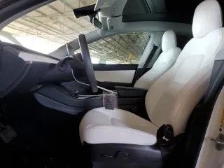 2021 Tesla Model Y Long Range with VIN 5YJYGDEE6MF075819, listed as a Copart auction lot 50903425 with 67,857 mi miles and Salvage Title. Bid and sale history available at DreamBid. Image 7.