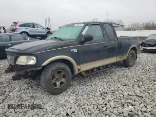 1999 Ford F-150 XL with VIN 2FTRX07W0XCA56178, listed as a Copart auction lot 79064324 with 188,479 mi miles and Salvage title. Bid and sale history available at DreamBid. Image 1.