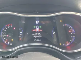 2015 Jeep Grand Cherokee SRT with VIN 1C4RJFDJ9FC842448, listed as a IAAI auction lot 41850385 with 178,439 mi miles. Bid and sale history available at carsss.com. Image 7.