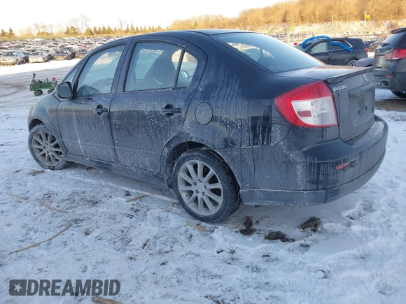 2008 Suzuki SX4 Touring Pkg 2 with VIN JS2YC417785100372, listed as a IAAI auction lot 41411720 with 179,468 mi miles. Bid and sale history available at carsss.com. Image 3.