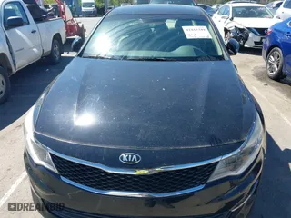 2016 Kia Optima LX with VIN 5XXGT4L3XGG013835, listed as a IAAI auction lot 41815349 with 120,628 mi miles. Bid and sale history available at carsss.com. Image 6.