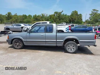 1992 Mazda B-Series Truck with VIN JM2UF313XN0306779, listed as a IAAI auction lot 42104583 with 137,826 mi miles and . Bid and sale history available at DreamBid. Image 14.