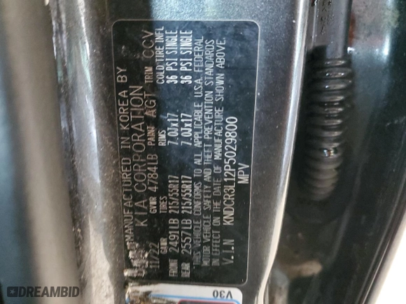 2023 Kia Niro EV Wind with VIN KNDCR3L12P5029800, listed as a Copart auction lot 49516985 with 8,966 mi miles and Salvage Title. Bid and sale history available at carsss.com. Image 12.
