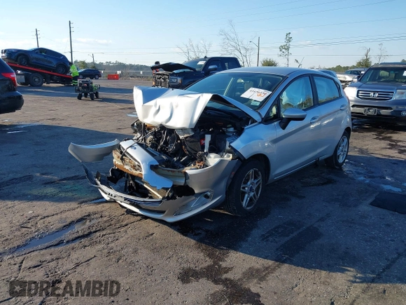 2017 Ford Fiesta SE with VIN 3FADP4EJ7HM118700, listed as a IAAI auction lot 41656550 with 81,995 mi miles. Bid and sale history available at carsss.com. Image 2.