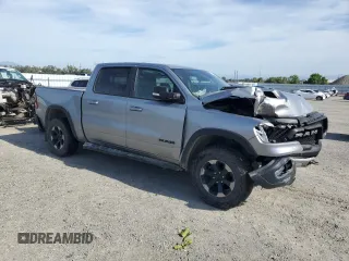 2020 Ram 1500 Rebel with VIN 1C6SRFLT0LN215917, listed as a Copart auction lot 58087705 with 69,683 mi miles and Salvage title. Bid and sale history available at DreamBid. Image 4.