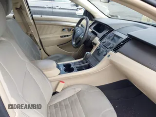 2014 Ford Taurus SE z VIN 1FAHP2D87EG165025, wystawiony jako IAAI lot #42226401 z przebiegiem 209 411 mil mil oraz . Historia ofert i sprzedaży dostępna na DreamBid. Obrazek 5.
