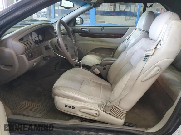 2004 Chrysler Sebring Limited z VIN 1C3EL65R94N151990, wystawiony jako Copart lot #53374215 z przebiegiem 66 257 mil mil oraz Szkoda całkowita • Salvage title. Historia ofert i sprzedaży dostępna na DreamBid. Obrazek 7.