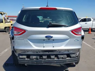 2016 Ford Escape SE with VIN 1FMCU9GX8GUC48620, listed as a IAAI auction lot 41970304 with 65,653 mi miles. Bid and sale history available at carsss.com. Image 6.