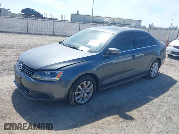2013 Volkswagen Jetta Sedan SE w/Convenience/Sunroof with VIN 3VWBP7AJ3DM258887, listed as a IAAI auction lot 41611167 with 134,406 mi miles. Bid and sale history available at carsss.com. Image 2.