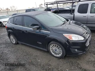 2015 Ford C-Max Energi SEL with VIN 1FADP5CU6FL118656, listed as a Copart auction lot 80762113 with 131,603 mi miles and Salvage Title. Bid and sale history available at carsss.com. Image 4.