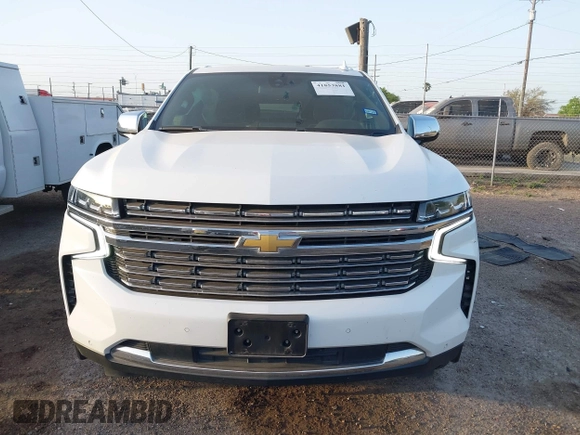 2022 Chevrolet Suburban Premier with VIN 1GNSCFKDXNR180648, listed as a IAAI auction lot 41853881 with 73,023 mi miles and . Bid and sale history available at DreamBid. Image 12.