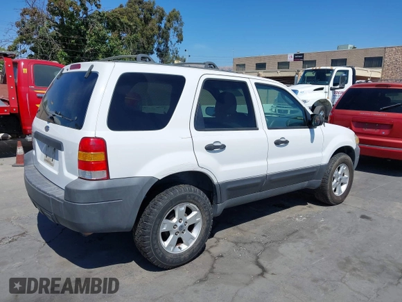 2005 Ford Escape XLT with VIN 1FMCU03195KA67225, listed as a IAAI auction lot 42614934 with 223,473 mi miles and . Bid and sale history available at DreamBid. Image 4.