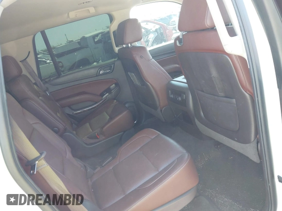 2016 Chevrolet Tahoe LTZ with VIN 1GNSCCKC1GR404754, listed as a IAAI auction lot 41831879 with 139,681 mi miles and . Bid and sale history available at DreamBid. Image 8.