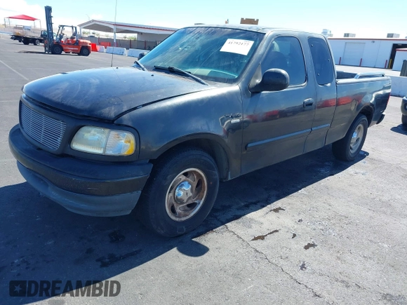 1999 Ford F-150 with VIN 1FTRX17W5XKB46900, listed as a IAAI auction lot 41792177 with Not provided miles and . Bid and sale history available at DreamBid. Image 2.