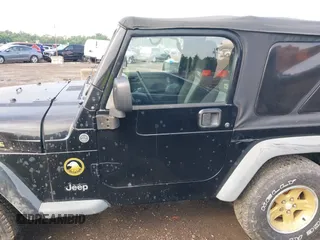 2006 Jeep Wrangler Sport z VIN 1J4FA49S06P721223, wystawiony jako IAAI lot #42654272 z przebiegiem 225 223 mil mil oraz . Historia ofert i sprzedaży dostępna na DreamBid. Obrazek 14.