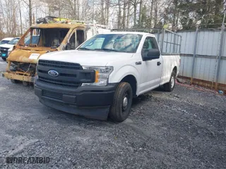 2019 Ford F-150 XL with VIN 1FTMF1CBXKKC54874, listed as a IAAI auction lot 41526336 with 112,563 mi miles. Bid and sale history available at carsss.com. Image 2.