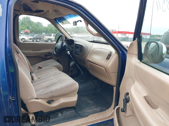 1998 Ford F-150 with VIN 1FTZF1725WNB76296, listed as a IAAI auction lot 42278511 with 223,324 mi miles and . Bid and sale history available at DreamBid. Image 5.