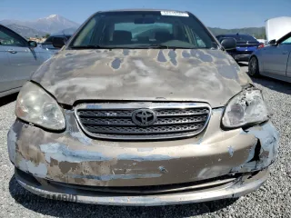 2007 Toyota Corolla CE with VIN 1NXBR32E17Z864384, listed as a Copart auction lot 52519385 with 204,778 mi miles and Salvage Title. Bid and sale history available at carsss.com. Image 5.