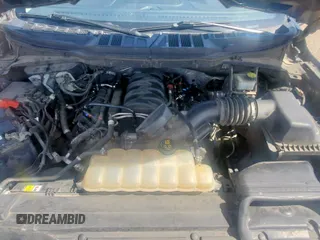 2021 Ford F-150 XL with VIN 1FTMF1C51MKD73149, listed as a Copart auction lot 65839105 with 95,957 mi miles and Clean title. Bid and sale history available at DreamBid. Image 7.