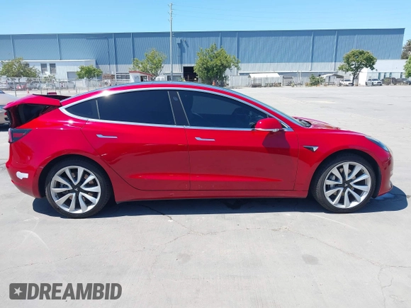 2018 Tesla Model 3 Long Range Battery z VIN 5YJ3E1EAXJF048839, wystawiony jako IAAI lot #42328412 z przebiegiem 83 083 mil mil oraz . Historia ofert i sprzedaży dostępna na DreamBid. Obrazek 13.