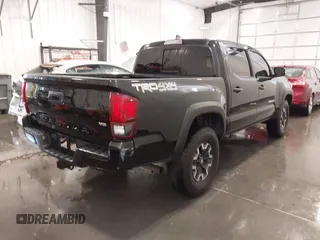2019 Toyota Tacoma SR with VIN 5TFCZ5AN7KX167511, listed as a IAAI auction lot 42360585 with 65,213 mi miles and . Bid and sale history available at DreamBid. Image 4.