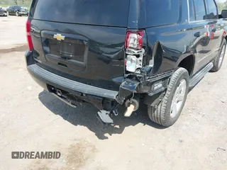 2015 Chevrolet Tahoe LT with VIN 1GNSCBKC9FR679748, listed as a IAAI auction lot 42018017 with 224,264 mi miles and . Bid and sale history available at DreamBid. Image 6.