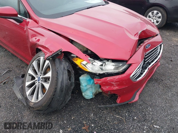 2020 Ford Fusion SE z VIN 3FA6P0T97LR234873, wystawiony jako IAAI lot #41510333 z przebiegiem 65 243 mil mil oraz . Historia ofert i sprzedaży dostępna na DreamBid. Obrazek 6.