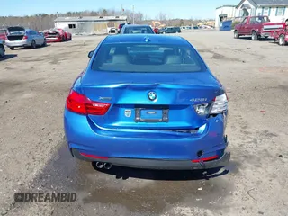 2014 BMW 4 Series 428i xDrive z VIN WBA3N5C50EF715770, wystawiony jako IAAI lot #41803713 z przebiegiem 77 602 mil mil oraz . Historia ofert i sprzedaży dostępna na DreamBid. Obrazek 16.
