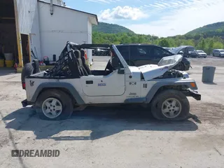 2006 Jeep Wrangler X with VIN 1J4FA39S36P703941, listed as a IAAI auction lot 42220361 with 148,829 mi miles and . Bid and sale history available at DreamBid. Image 13.