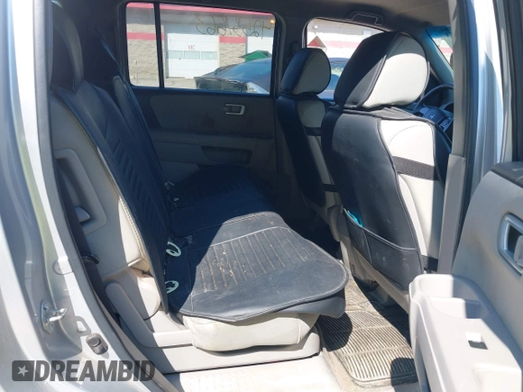 2011 Honda Pilot LX with VIN 5FNYF4H27BB036500, listed as a IAAI auction lot 42537663 with 179,424 mi miles and . Bid and sale history available at DreamBid. Image 8.