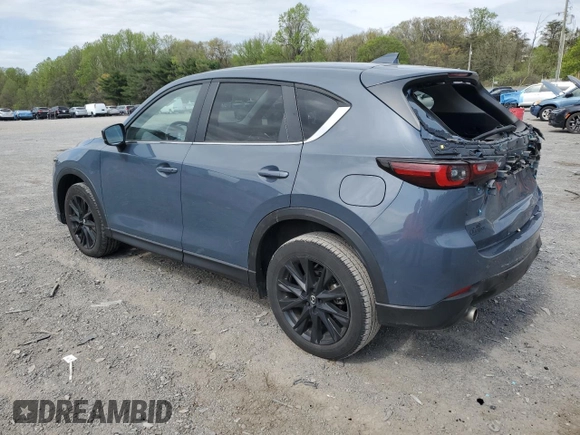 2023 Mazda CX-5 S Carbon Edition z VIN JM3KFBCM9P0158890, wystawiony jako Copart lot #53839045 z przebiegiem 26 623 mil mil oraz Szkody całkowita. Historia ofert i sprzedaży dostępna na DreamBid. Obrazek 2.